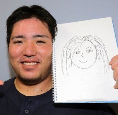 妻の似顔絵を披露する山川穂高選手